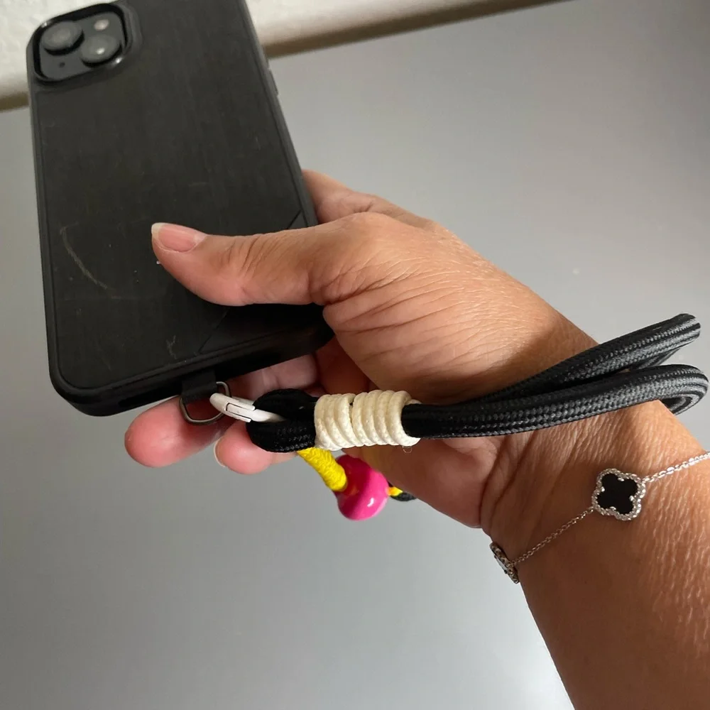 Black Phone Wrist Lanyard with Neon Accents and Pink Heart Bead